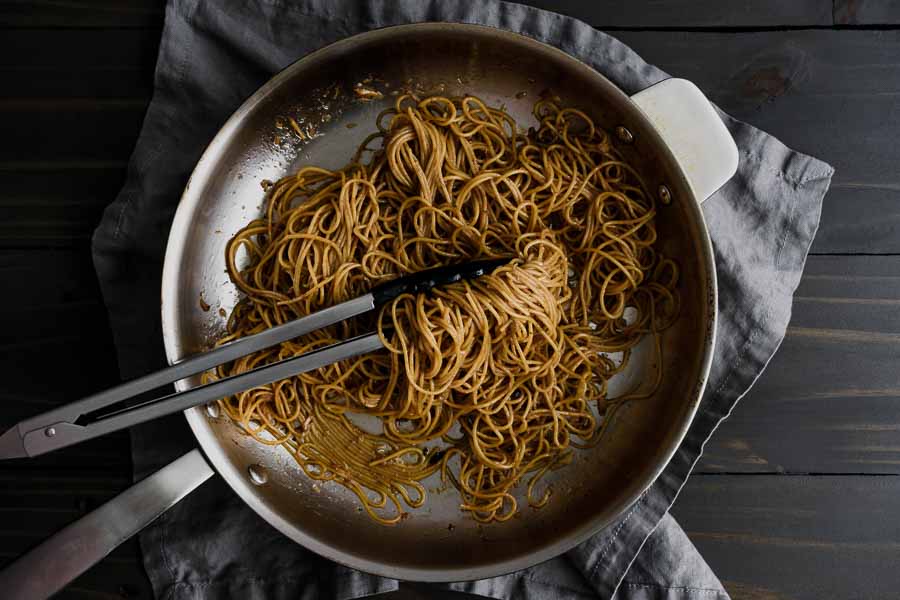 Tongs made mixing the noodles and garlic pasted easy