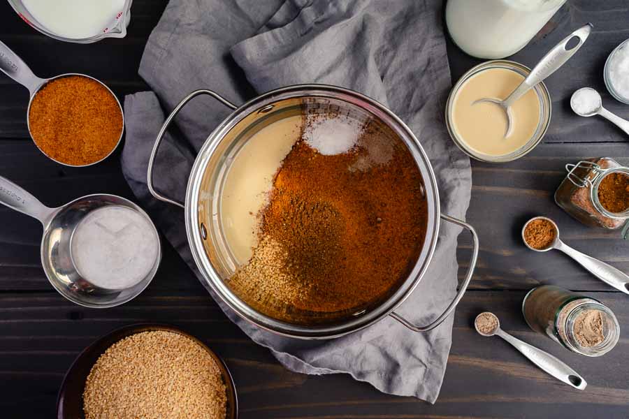 Step 1: Adding the spices, bulgur, palm sugar, and tahini, and milk to a saucepan