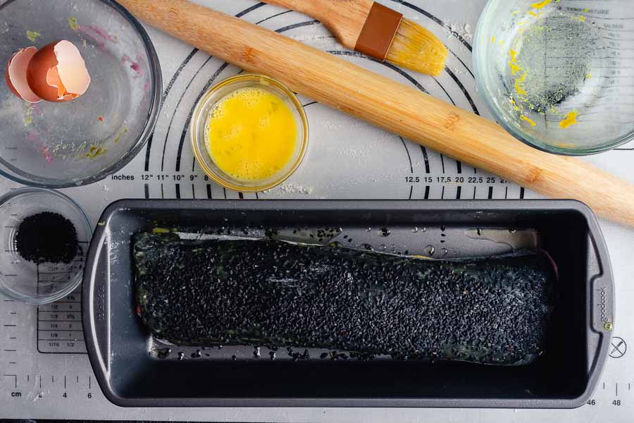 Unbaked bread in a loaf pan