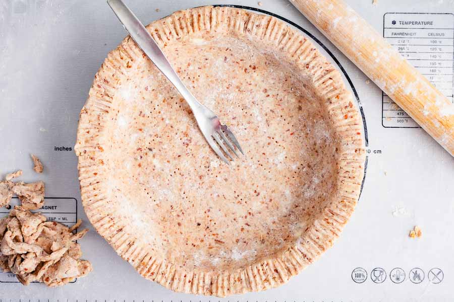 Pecan pie crust with a fork-crimped edge