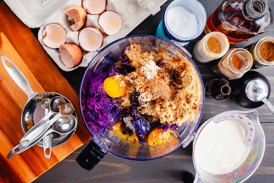 Purple sweet potato pie filling ingredients in a food processor